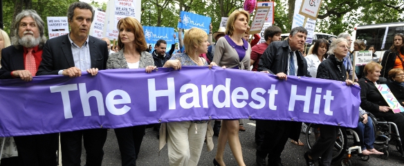 Photo of the Hardest Hit banner at the front of the March in May 2011